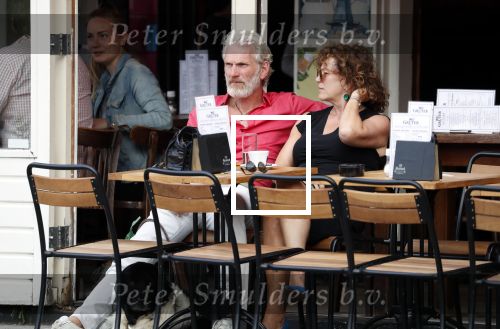 Amsterdam 11 juli 2018
Henriette Tol met haar man en hond op terras.