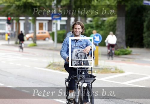 Amsterdam 27 juli 2022
Sascha Visser op de fiets in Amsterdam zuid