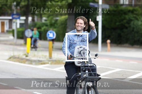 Amsterdam 27 juli 2022
Sascha Visser op de fiets in Amsterdam zuid