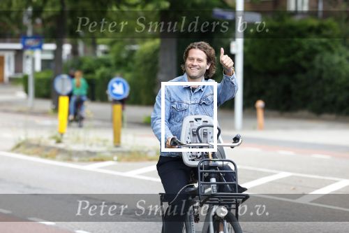 Amsterdam 27 juli 2022
Sascha Visser op de fiets in Amsterdam zuid