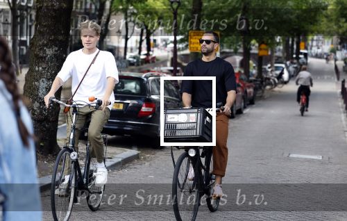 Amsterdam 12 juli 2023
freek bartels en Michael Muyderman op de fiets in het centrum van Amsterdam.