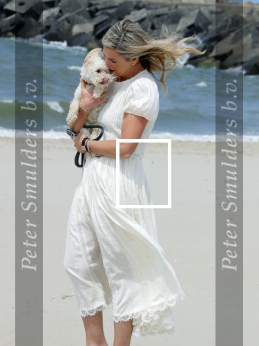 Den haag 30 juni 2023
Fotosessie op het strand Koning Willem Alexander, koningin Maxima en prinses Ariane, Prinses  Amalia en Prinses Alexia poseren tijdens de fotosessie op het strand met hond mambo.