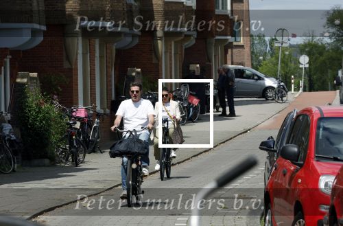 Amsterdam 4 juli 2024
Twan Huys met zijn vrouw op de fiets in het centrum van Amsterdam.