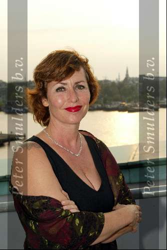 Amsterdam 28 augustus 2002
Angela Groothuizen  Premiere Snapshot.
Tatoeage