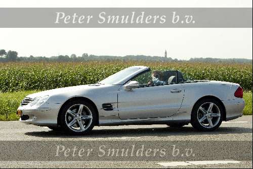 Hilversum26 augustus 2002
Robert Jensen in zijn nieuwe mercedes SL 500