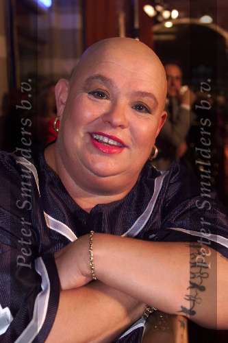 Amsterdam 1 januari 2000
Staatsloterij show op locatie in Magna Plaza.
Sugar Lee Hooper met tatoage