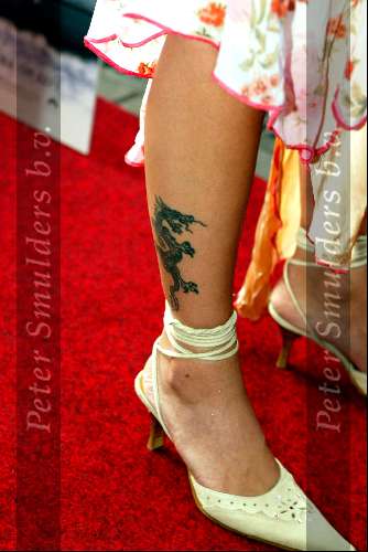 Amsterdam 4 augustus 2003
Premiere Tomb Raider in tushinski
Jennifer de Jong met man en tatoo