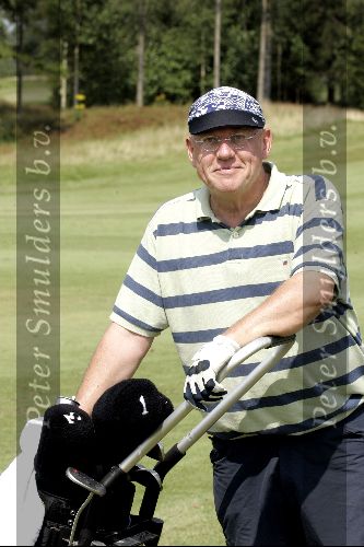 Eemnes 1 augustus 2004
Golfen voor een goed doel op  golfclub de Goyer.
Karel v d Graaf met pet