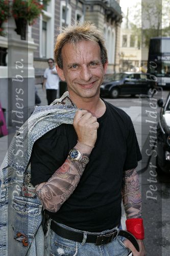 Amsterdam 31 augustus 2005
Presentatie Glamour en Lady card in Amstel hotel.
Johan Vlemmix met tatoo shirt