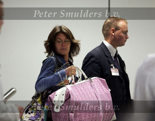 Schiphol 9 augustus 2005
Harry mens met zijn nieuwe vriendin Lara op  Schiphol