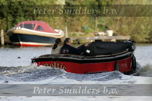 Weesp 28 augustus 2005
Maarten Spanjer varen met boot met dochter Paul Huf.