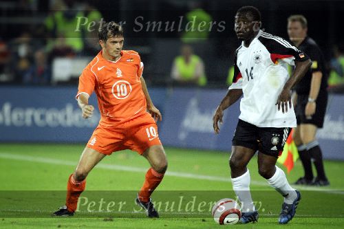 Rotterdam 17 Augustus 2005 oefeninterland nederland - duitsland 2-2 phillip cocu en gerald asamoah.