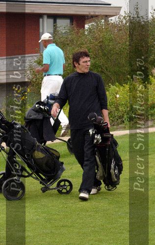 Amsterdam 19 augustus 2005
Wim v Hanegem golfen op houtrak. 
de kromme op golfschoen
