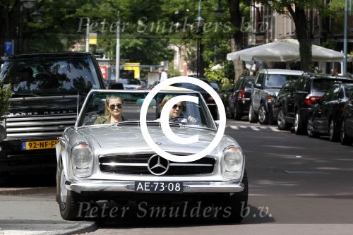 Amsterdam 20 augustus 2011
Wesly Bronkhorst met zijn vriendin Renee Gunning in Mercedes cabrio.
Peter Smulders bv