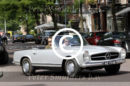 Amsterdam 20 augustus 2011
Wesly Bronkhorst met zijn vriendin Renee Gunning in Mercedes cabrio.
Peter Smulders bv