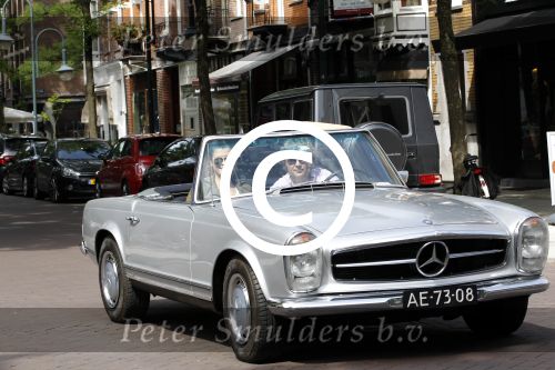 Amsterdam 20 augustus 2011
Wesly Bronkhorst met zijn vriendin Renee Gunning in Mercedes cabrio.
Peter Smulders bv