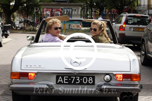 Amsterdam 20 augustus 2011
Wesly Bronkhorst met zijn vriendin Renee Gunning in Mercedes cabrio.
Peter Smulders bv