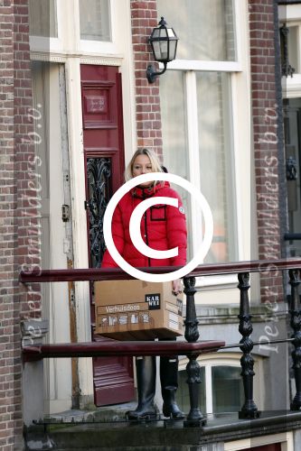 Amsterdam 9 december 2012
Tess Milne aan het verhuizen naar haar nieuwe huis aan de amsterdamse grachten.
Peter Smulders bv