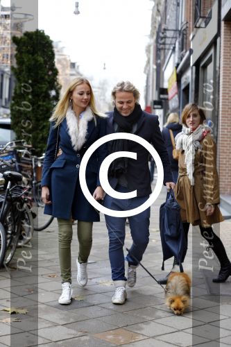 Amsterdam 30 november 2013
John Ewbank en Kelly Weekers met hun hondje op de pc hooftstraat