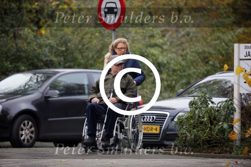 Amsterdam 20 november 2014
Ed v Tijn in rolstoel met zijn vrouw Odette