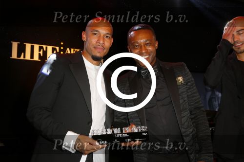 Amsterdam 15 november 2014
Life After Football (LAF) beurs in de Harbour Club. Nigel de Jong met Regi Blinker