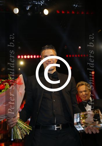 Amsterdam 16 december 2014
Sportman van het jaar verkiezing in de RAI.
Robin v Persie met zijn vrouw Bouchra en zijn moeder en opa