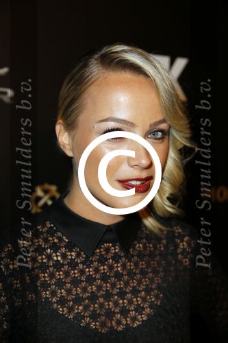 Amsterdam 8 november 2014
JFK Gala in de harbour club. Tess Milne met een kennis