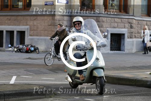 Amsterdam 28 november 2015  
Huub Stapel op zijn vespa scooter