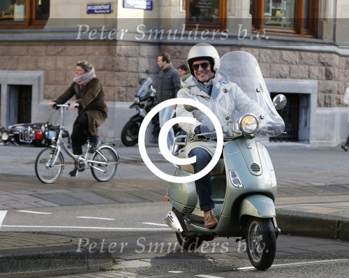 Amsterdam 28 november 2015  
Huub Stapel op zijn vespa scooter