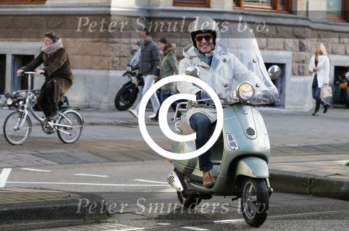 Amsterdam 28 november 2015  
Huub Stapel op zijn vespa scooter