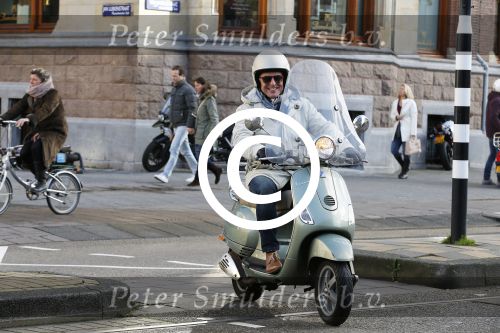 Amsterdam 28 november 2015  
Huub Stapel op zijn vespa scooter