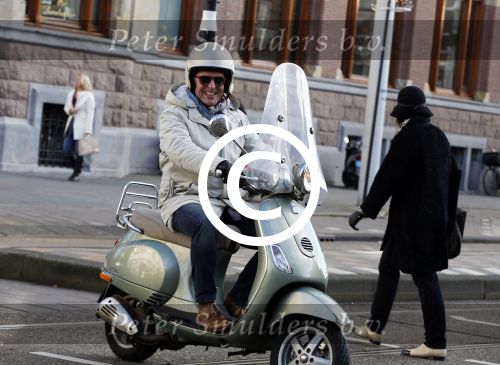 Amsterdam 28 november 2015  
Huub Stapel op zijn vespa scooter