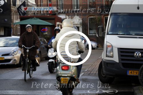 Amsterdam 28 november 2015  
Huub Stapel op zijn vespa scooter