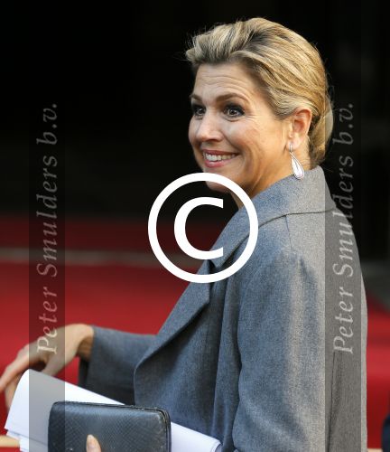 Amsterdam 25 november 2015 
Koninmg Willem Alexander en Koningin Maxima  arriveren bij het paleis op de dam in hun auto (audi A8)