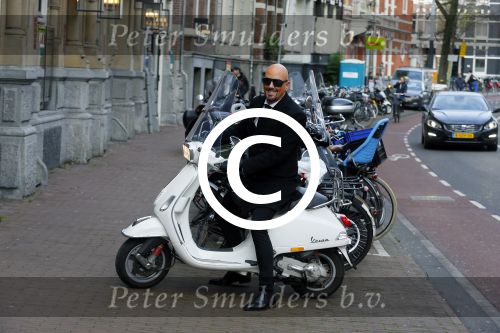 Amsterdam 23 november 2015
Maik de Boer op zijn vespa scooter op straat