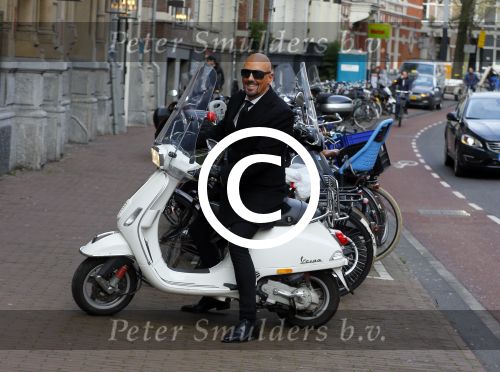 Amsterdam 23 november 2015
Maik de Boer op zijn vespa scooter op straat