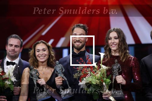Amsterdam 19 december 2018
Sportman van het jaar verkiezing in afas live. Kjeld Nuis met Sportvrouw van het Jaar 2018 Suzanne Schulting, gehandicapte sporter van het Jaar 2018 Bibian Mentel en de coaches van het Jaar 2018 Jac Orie en Raemon Sluijter De baanwielrenners werden ploeg van het jaar, Marianne Timmer kreeg een ouvre prijs en Rico Verhoeven werd door de Zapp kijkers gekozen tot meest populaire sporter.