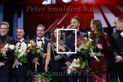 Amsterdam 19 december 2018
Sportman van het jaar verkiezing in afas live. Kjeld Nuis met Sportvrouw van het Jaar 2018 Suzanne Schulting, gehandicapte sporter van het Jaar 2018 Bibian Mentel en de coaches van het Jaar 2018 Jac Orie en Raemon Sluijter De baanwielrenners werden ploeg van het jaar, Marianne Timmer kreeg een ouvre prijs en Rico Verhoeven werd door de Zapp kijkers gekozen tot meest populaire sporter.
