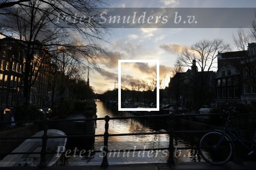 Amsterdam 22 november 2020
Ondergaande zon bij de Amsterdamse grachten en de westertoren.
