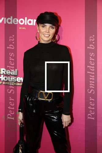 Amsterdam 22 november 2022
Presentatie Real Housewifes of Amsterdam in Hotel Krasnapolsky  van Videoland. Kim Feenstra kwam met haar partner Stanley Tailor en zijn moeder