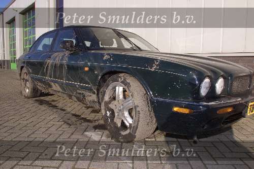 Oss 21 december 2000
ongeluks auto Ron Brandsteder.
Jaguar.