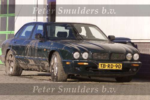 Oss 21 december 2000
ongeluks auto Ron Brandsteder.
Jaguar.