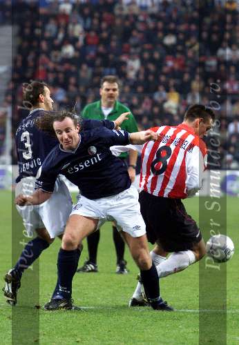 Eindhoven, 9 december 2001
Kompetitie Seizoen 2001/2001
PSV - FC Twente, eindstand 1-0
Spira Grujic, Jan Venngeoor of Hesslink  en Patrick Pothuizen