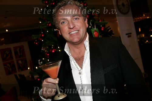 Amsterdam 12 december 2005
Kerstdiner bij de kersentuin met bn ers van Talpa in keuken en bediening.  Gordon