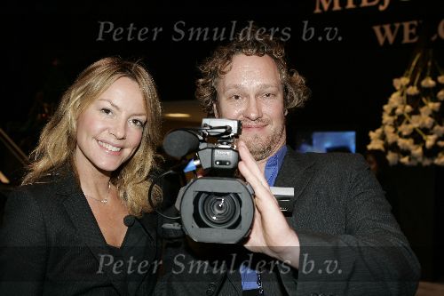 Amsterdam 10 november 2005
 de miljonair fair  
Micky Hoogendijk met cameraman van RNN7