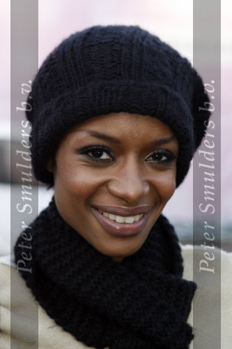 Amsterdam 26 januari 2007
Sylvana Simons bij modeshow Ilja Visser tijdens amsterdam fashion week. Sylvana heeft muts op.