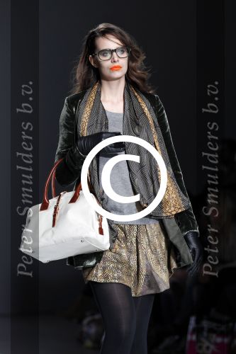 Amsterdam 28 januari 2012
modeshow Custo op de IAFW met oa aanwezig Martijn en Amanda Krabbe met hun dochters.
Peter Smulders bv