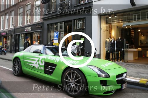 Amsterdam 4 februari 2013
Een groend mercedes sport met reclame voor KPN en het G4 netwerk.
Peter Smulders bv