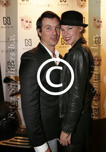 Amsterdam 5 februari 2013
Modeshow Nikkie Plessen bij the harbour Club. Nicolette Kluijver met man
Peter Smulders bv
