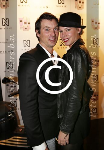 Amsterdam 5 februari 2013
Modeshow Nikkie Plessen bij the harbour Club. Nicolette Kluijver met man
Peter Smulders bv